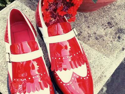Red and white paint leather shoe