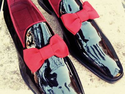 Shoe leather paint with red bowtie